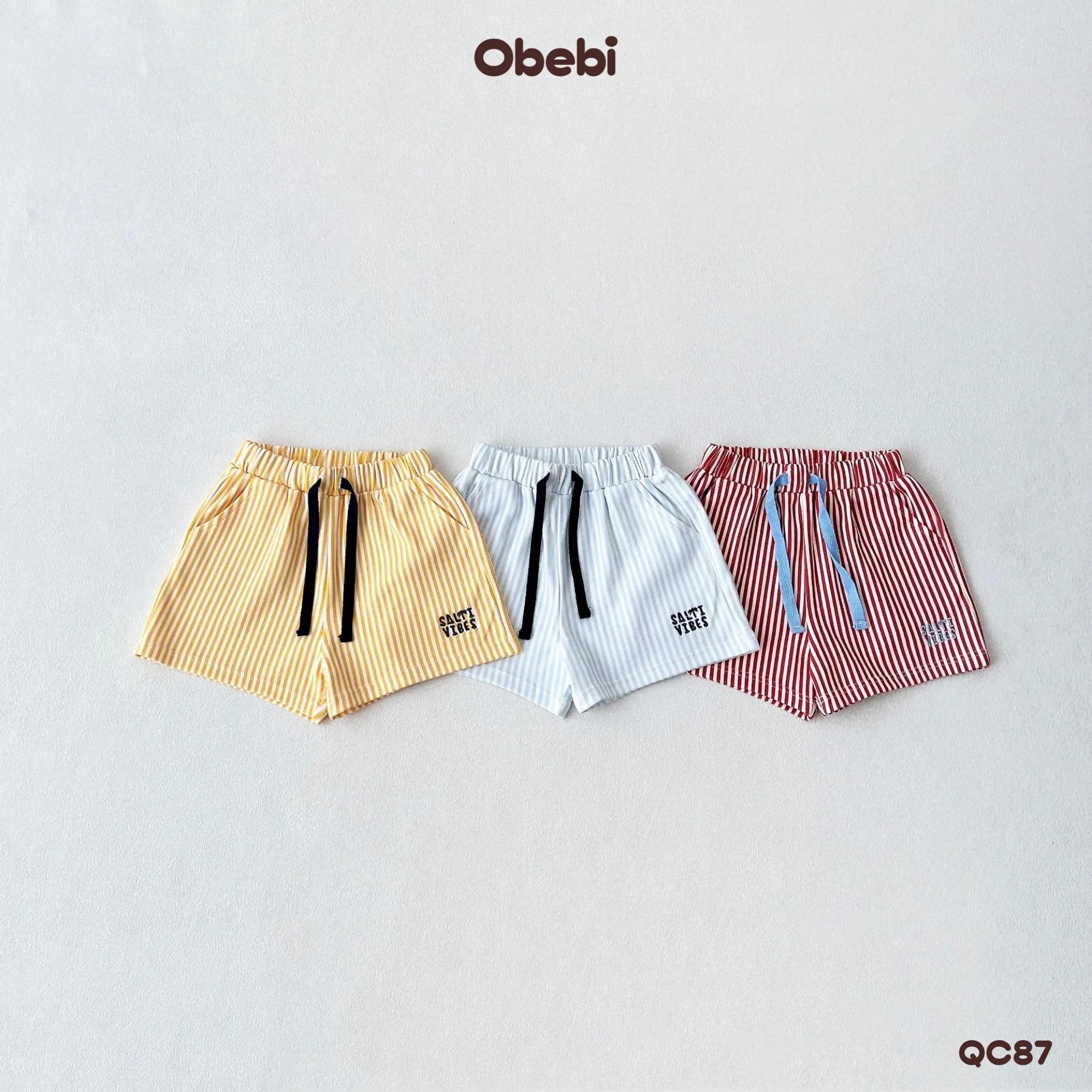 QC87 – Quần Đùi Trẻ Em Mùa Hè Kẻ Sọc Đi Biển Obebi