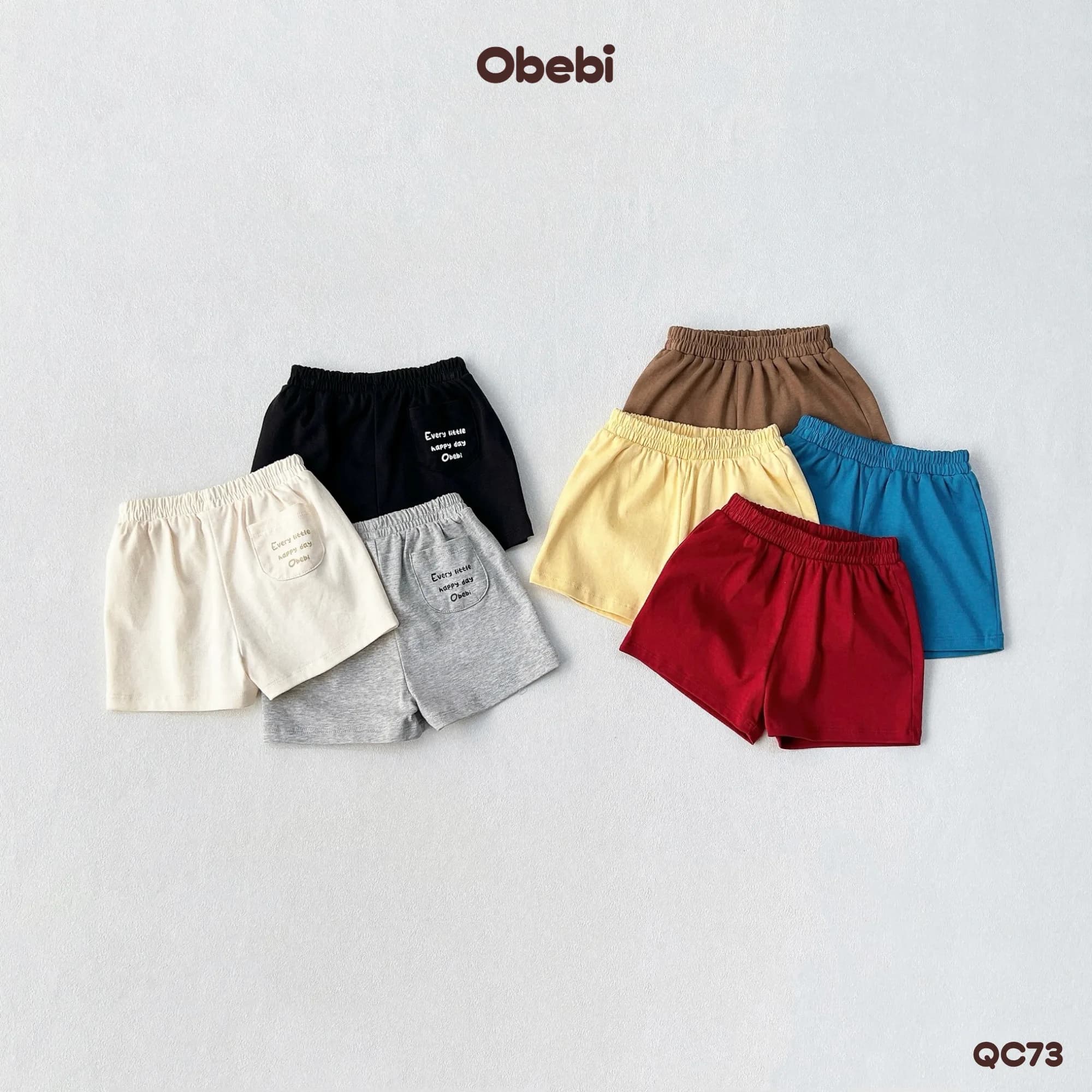 QC73 – Quần đùi trẻ em mùa hè thêu túi sau Obebi