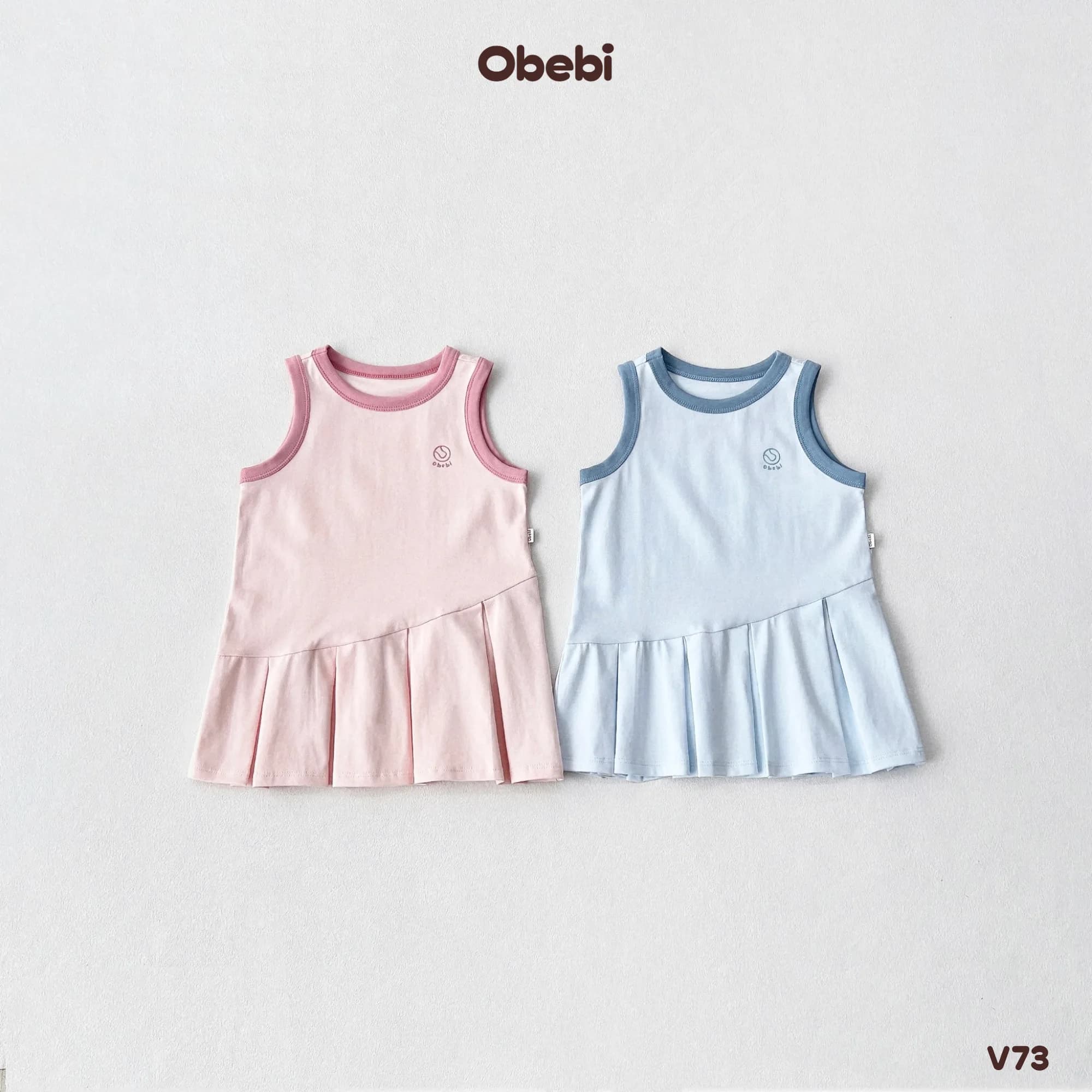 V73 – Váy Ba Lỗ Bé Gái Mùa Hè Xếp Ly Lệch Obebi
