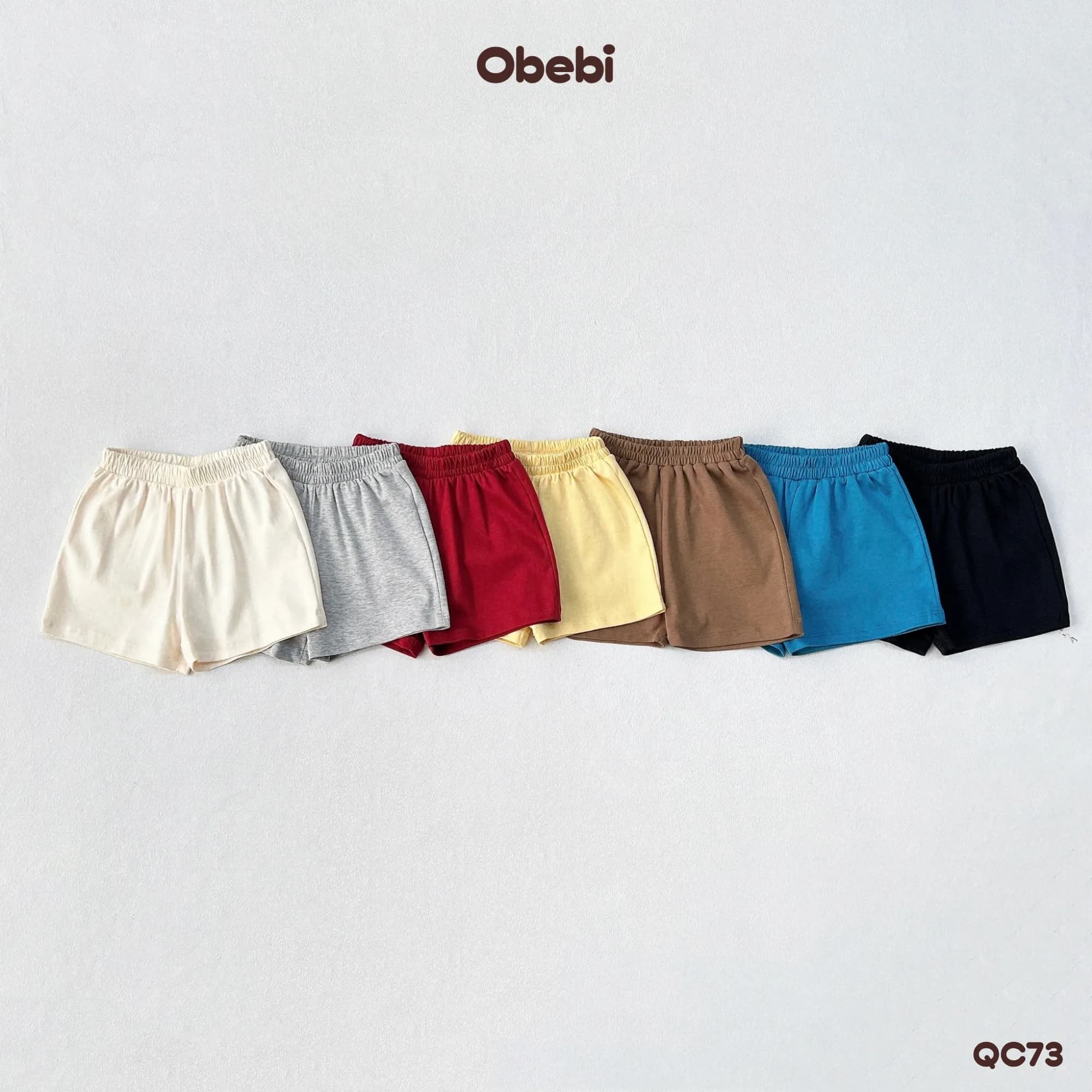 QC73 – Quần đùi trẻ em mùa hè thêu túi sau Obebi