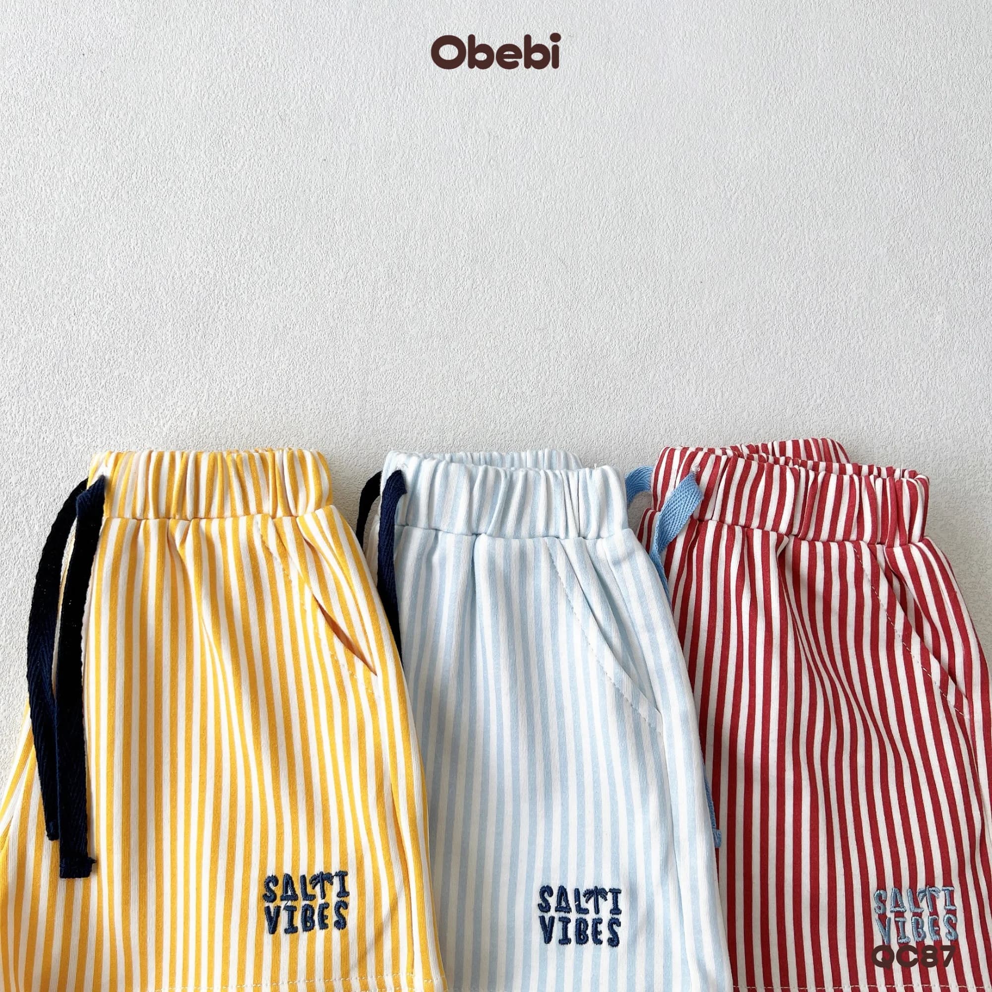 QC87 – Quần Đùi Trẻ Em Mùa Hè Kẻ Sọc Đi Biển Obebi